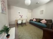 Central 2 bed flat with off street-parking