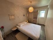 Appartement en rez-de-jardin avec terrasse privative