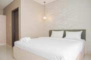 Elegant 2BR Ciputra International Apartment near Puri Indah Mall By Travelio