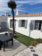 Les pieds dans le sable Les pieds dans le sable