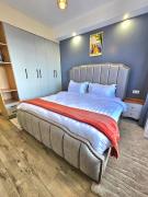 elegant urban escape apartment with heated swimming pool, fully equipped gym,children playing ground,amazing city views and private parking space