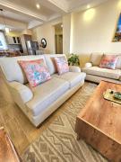 The comfort executive loft apartment with amazin breathtaking city views ,heated swimming pool,gym and rooftop chill spot with offers breathtaking city views ,private ample parking space with designated child playground area