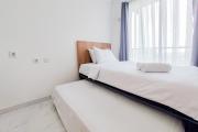 Comfort Stay Studio at Sky House BSD Apartment By Travelio