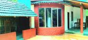 Dramatic Green Cottage