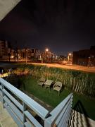 شقة فندقية بالشيخ زايد كمبوند جنه زايد بحديقة خاصة