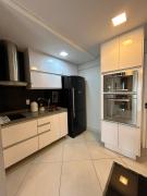 Apartamento beira-mar com piscina