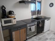 Appartement dans un pavillon avec accès au jardin