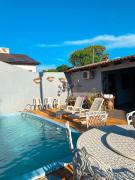 Casa com 2 suites e 1quarto piscina Ar para 8 hospedes