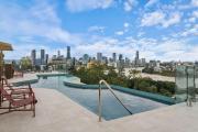 Skyline n Rooftop Pool 2BR Modern Stay Near CBD