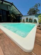 Casa Sol Nascente - Próxima ao Centro com Piscina e Ar Condicionado