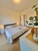 Modern flat and private attic close to beach