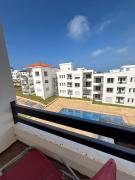 Apartment with pool view, 1 min to beach, private parking