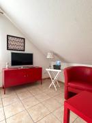 Ferienwohnung Muschel 2 mit gemeinschaftlichen Garten, Bensersiel