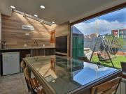 Casa con Quincho, Playroom y jardín en Ushuaia