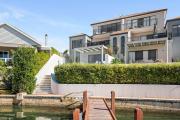 Pet Friendly Luxe Canals Waterfront Retreat with Private Jetty & Spa