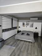 Black & White STUDIO by Emmelia Group