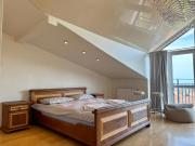 Dviaukštis butas Nidos centre, su panoraminiu vaizdu į marias