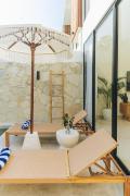 Canggu Private 2BR Pool Villa, High Ceilings, Designer Interior, 7 minutes Ride to the Beach