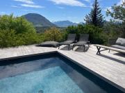 Maison en bois avec piscine chauffée et vue panoramique