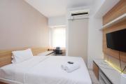 Modern Studio with Great Lake View at Springlake Summarecon Apartment By Travelio