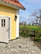 Lantlig lägenhet nära stranden