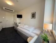 Modernes Studio mit Holzflair in Zentrumsnähe