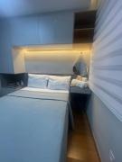 Quarto privativo em apartamento