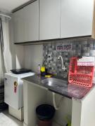 12 Kitnet, central, completa com tv smart