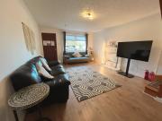 Cozy 2 bedrooms with private parking space and garden