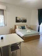 Appartamento con 2 camere, parcheggio e terrazza