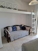 house with garden next to the sea