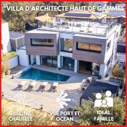 "ROOF TOP ET OCEAN" Villa dArchitecte, haut de gamme, 207 m2 habitables, 6 à 8 personnes, piscine chauffée, Roof Top vue Port et Océan, accès littoral à pied