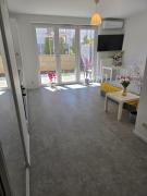 Apartament C10 z ogródkiem