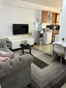 Cozy 1BR with Kitchen Balcony and Wi-Fi near CBD