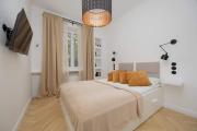 Elegant Apartment near Royal Baths Park by Noclegi Renters