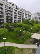 Cozy Urban Residence Studio - balcony with garden view