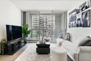 High-Rise 2BR Luxury Apartment NYC-Inspired Design with Pool Gym Parking and Waterfront Views