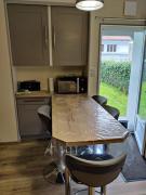 Maisonnette au pied du marché et 300 m de la plage