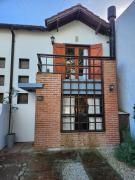 Comfortable duplex con garage