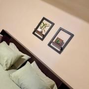 habitación doble, cama queen, terraza y plantas