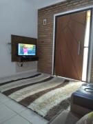 Casa com Ar condicionado na sala 300 m da praia