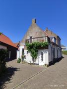 The cosy little house with the sundial