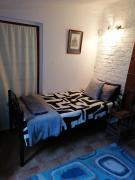 Ground Floor apartment-2 x single beds, TV,kitchen, own bathroom, patio