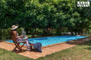 Nivaant Farms by StayVista - Green Retreat with Pool, Orchard, Jacuzzi & Gazebo