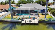 Luxury Waterfront Vacation Home with Dock and free heated Pool