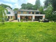 Lovely large modern home in private wooded estate