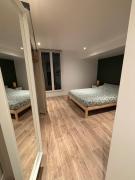 Appartement chez maison hôte rez de jardin