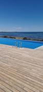 Posidonia Apartment, ground floor with garden,3 swimming pools, jacuzzi,parking space