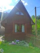 Chata pre hostí s ohniskom