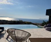 Villa Arkoudi - Enjoy panoramic ocean views from a serene mountain setting